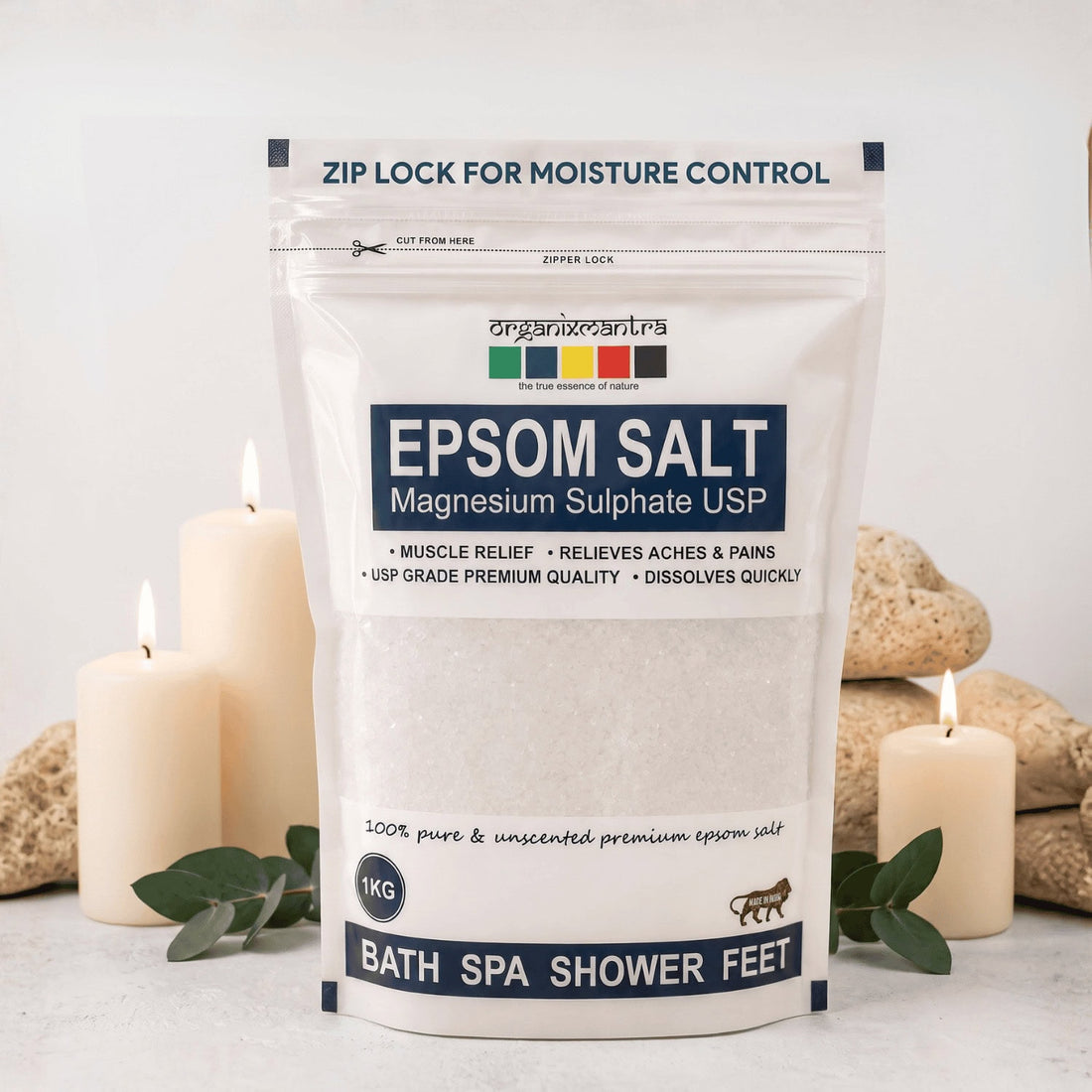 Organix Mantra Epsom Salt 1 kg zip-lock pouch, magnesium sulphate USP, styled with lit candles, pumice and eucalyptus
