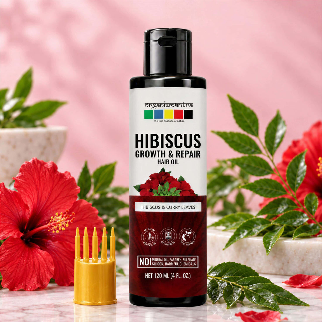 Organix Mantra Hibiscus Growth and Repair hair oil 120ml with red hibiscus flowers and curry leaves